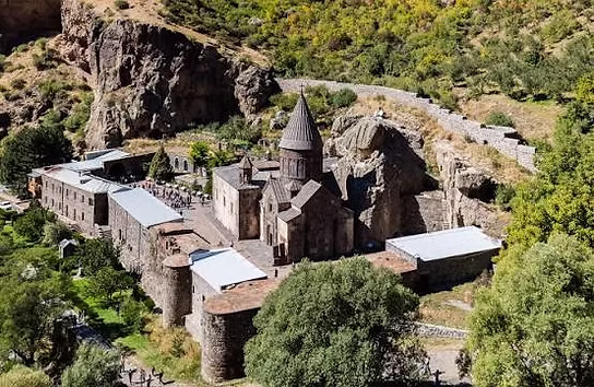 Armenian Lacrosse Coach Reads Story of Jesus’ Birth at Geghard Monastery on Day 8 of Bible Tour